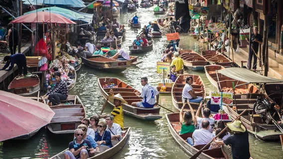 Damnoen Saduak Floating Market + Maeklong Railway Market One-Day Tour in Bangkok, Thailand