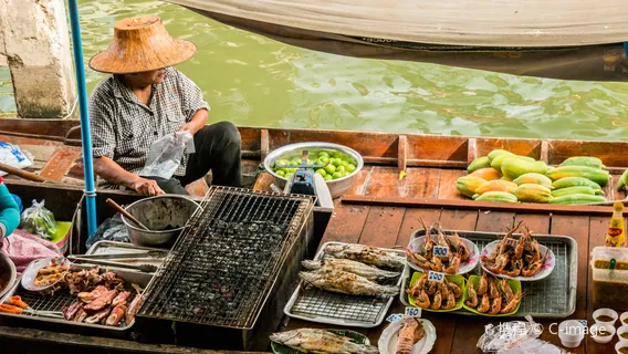 Damnoen Saduak Floating Market + Maeklong Railway Market One-Day Tour in Bangkok, Thailand