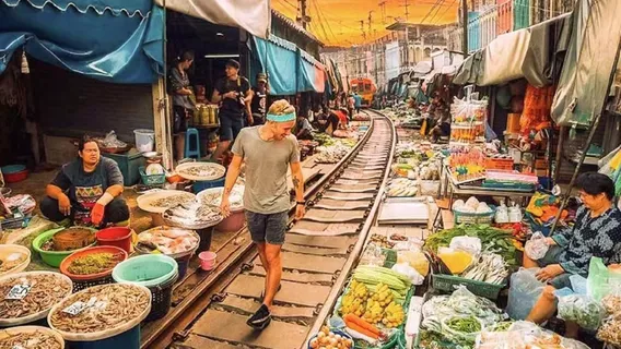Damnoen Saduak Floating Market + Maeklong Railway Market One-Day Tour in Bangkok, Thailand